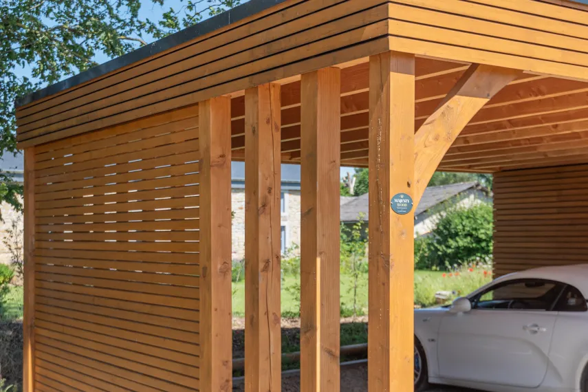 Carport à toiture plate avec abri intégré à Ohey
